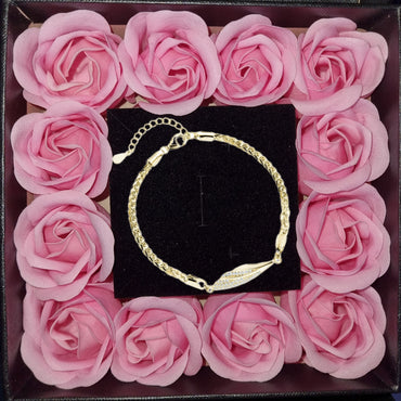 Luxory collection - Zirconia köves ezüst karkötő twist (Aranyozott)